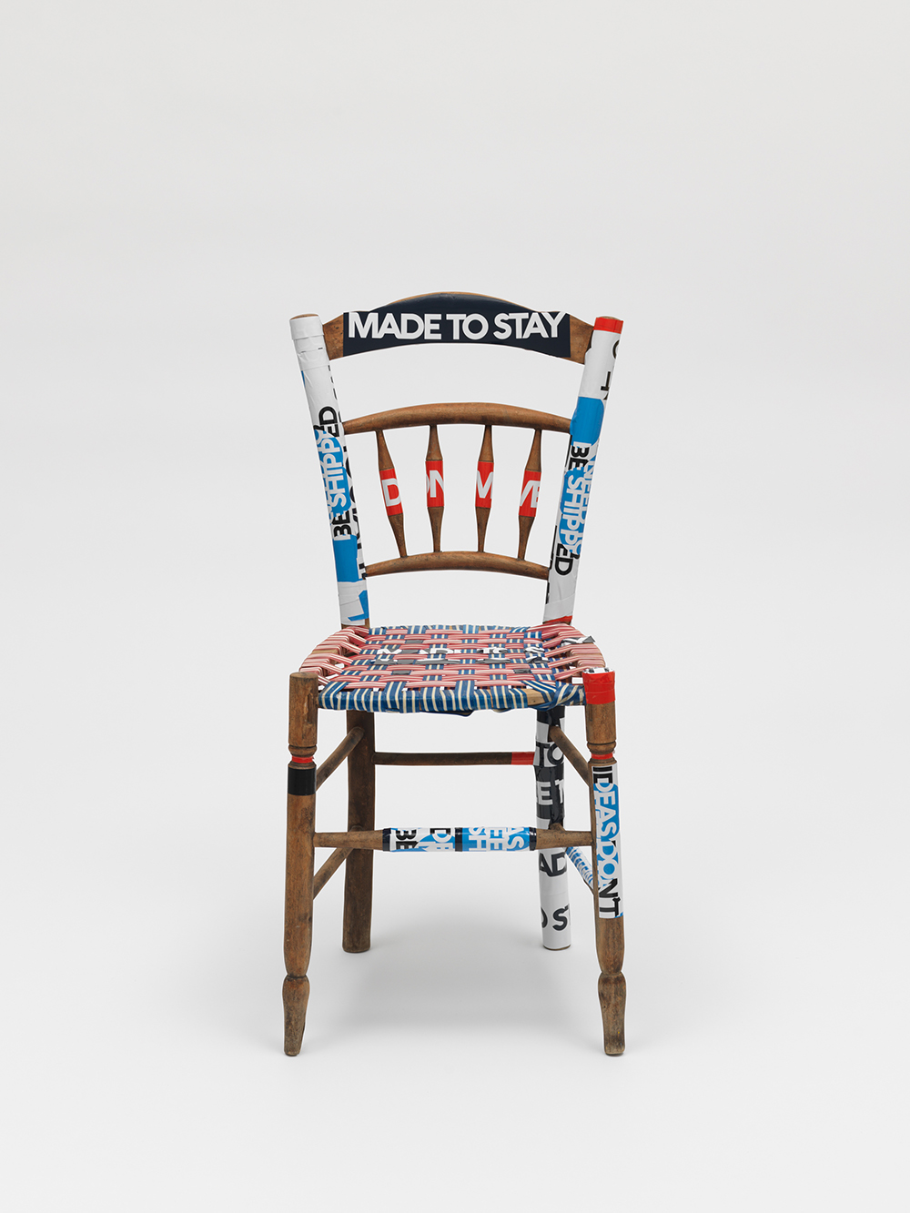 Product image: Wooden Chair, modified by Vasso & Evi, claim stickers, 2022 Athens, 4.6 tons