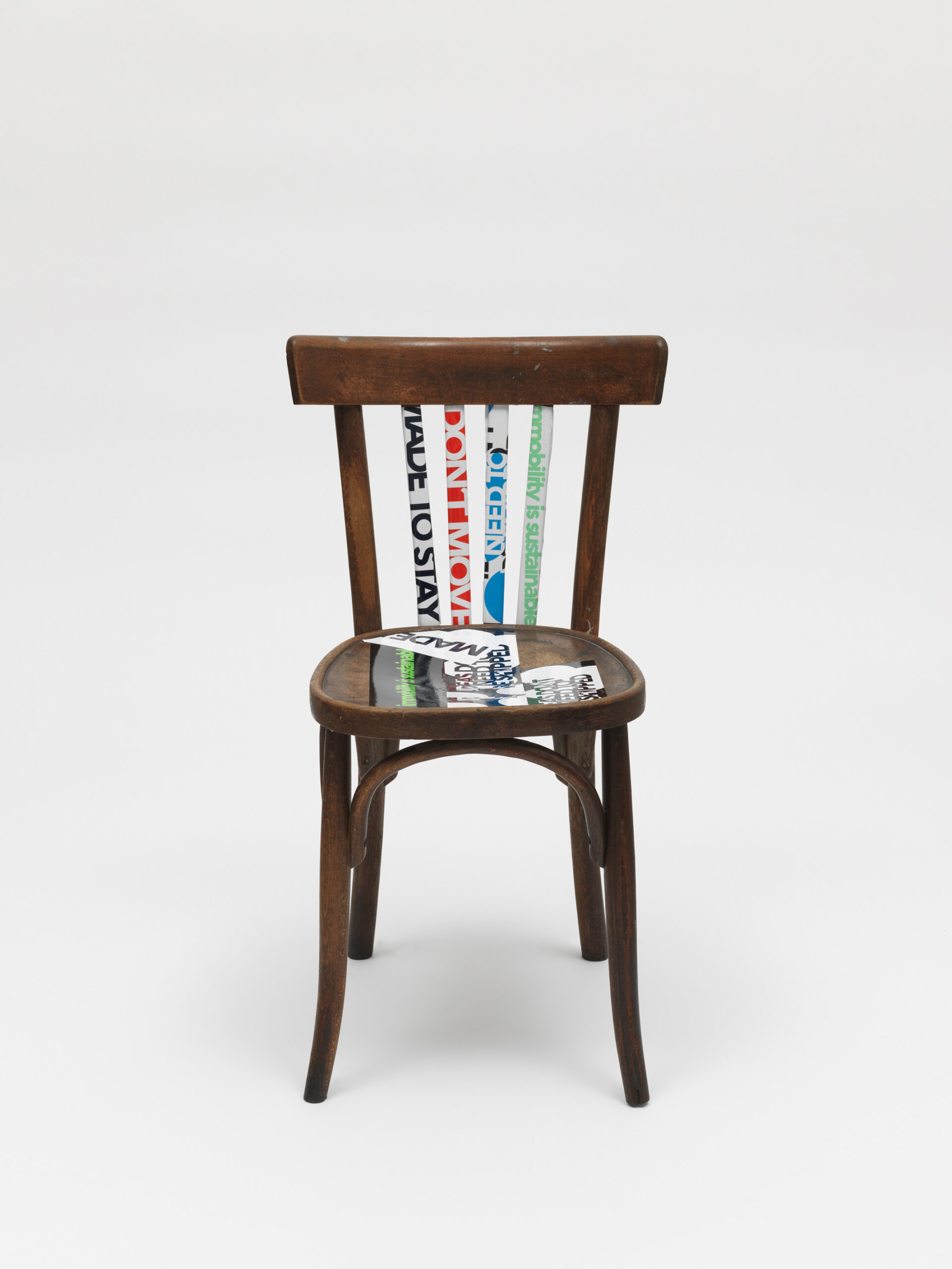 Product image: Kafeneion Chair, modified by Evi, claim stickers, 2022 Athens, 4.6 tons