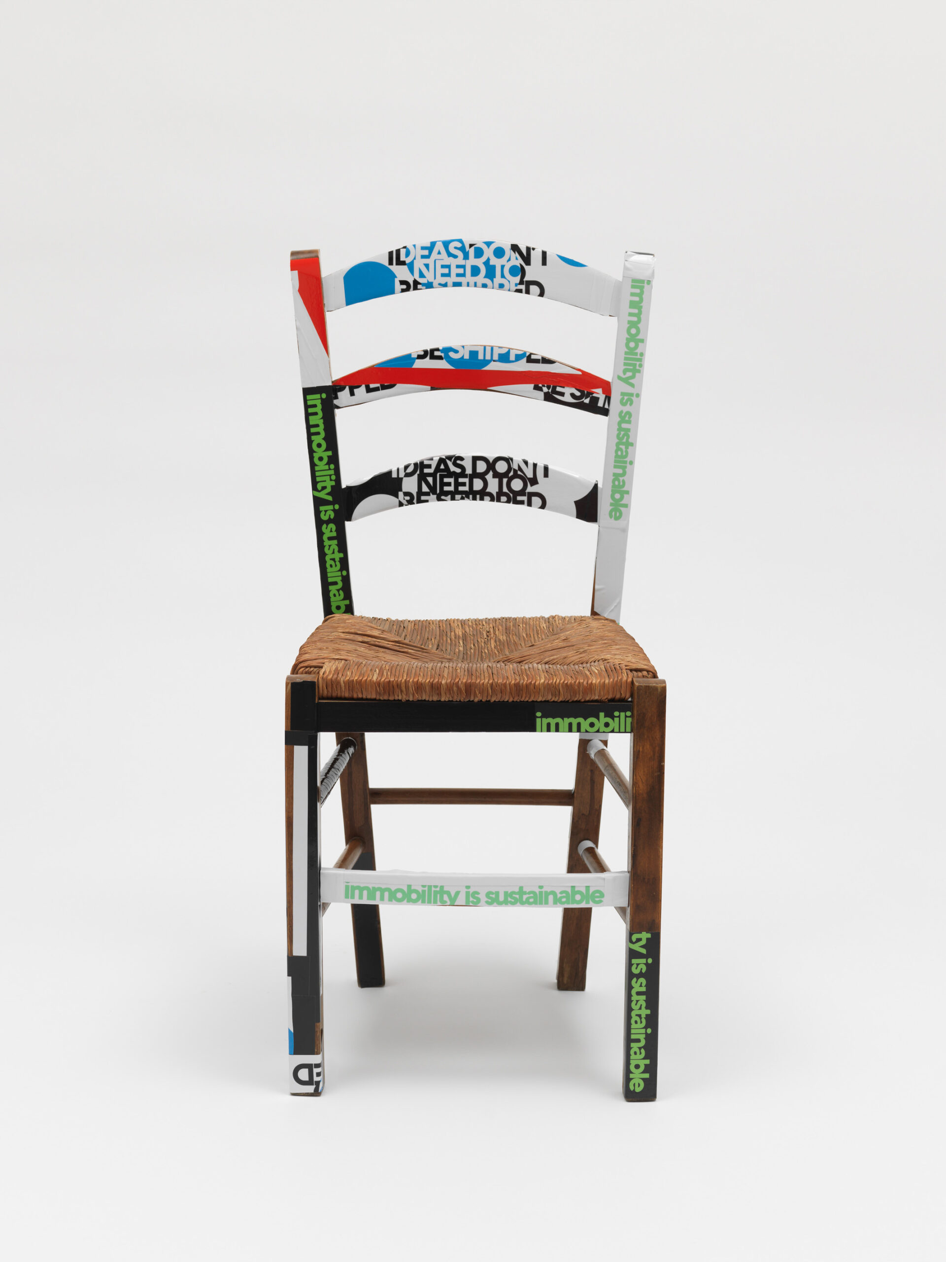 Product image: Kafeneion Chair, modified by Evi & Vasso, claim stickers, 2022 Athens, 4.6 tons